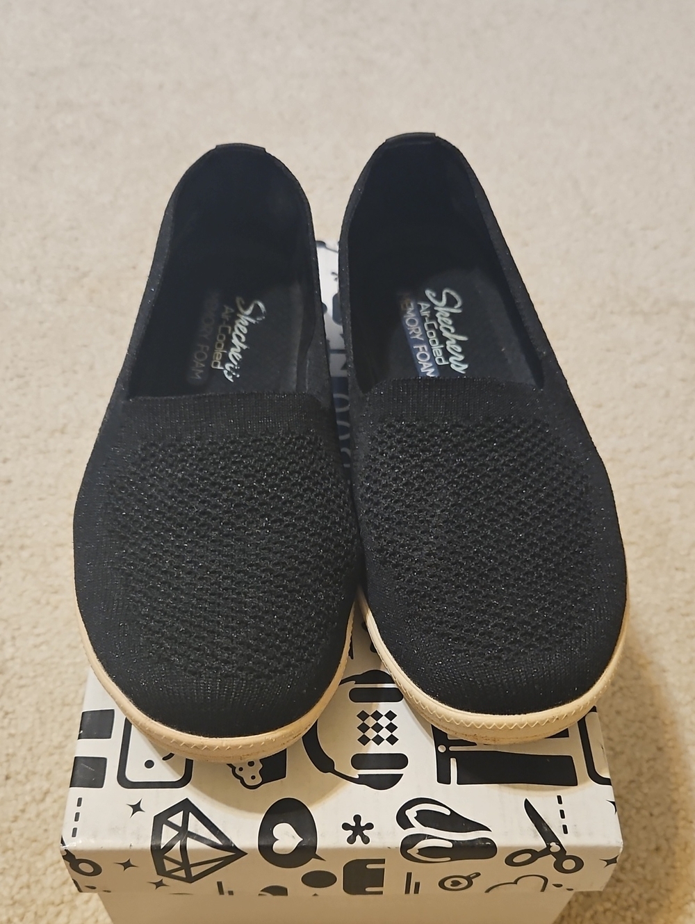 Skechers Women's Black Knit Slip-On Flats with Light Tan Sole